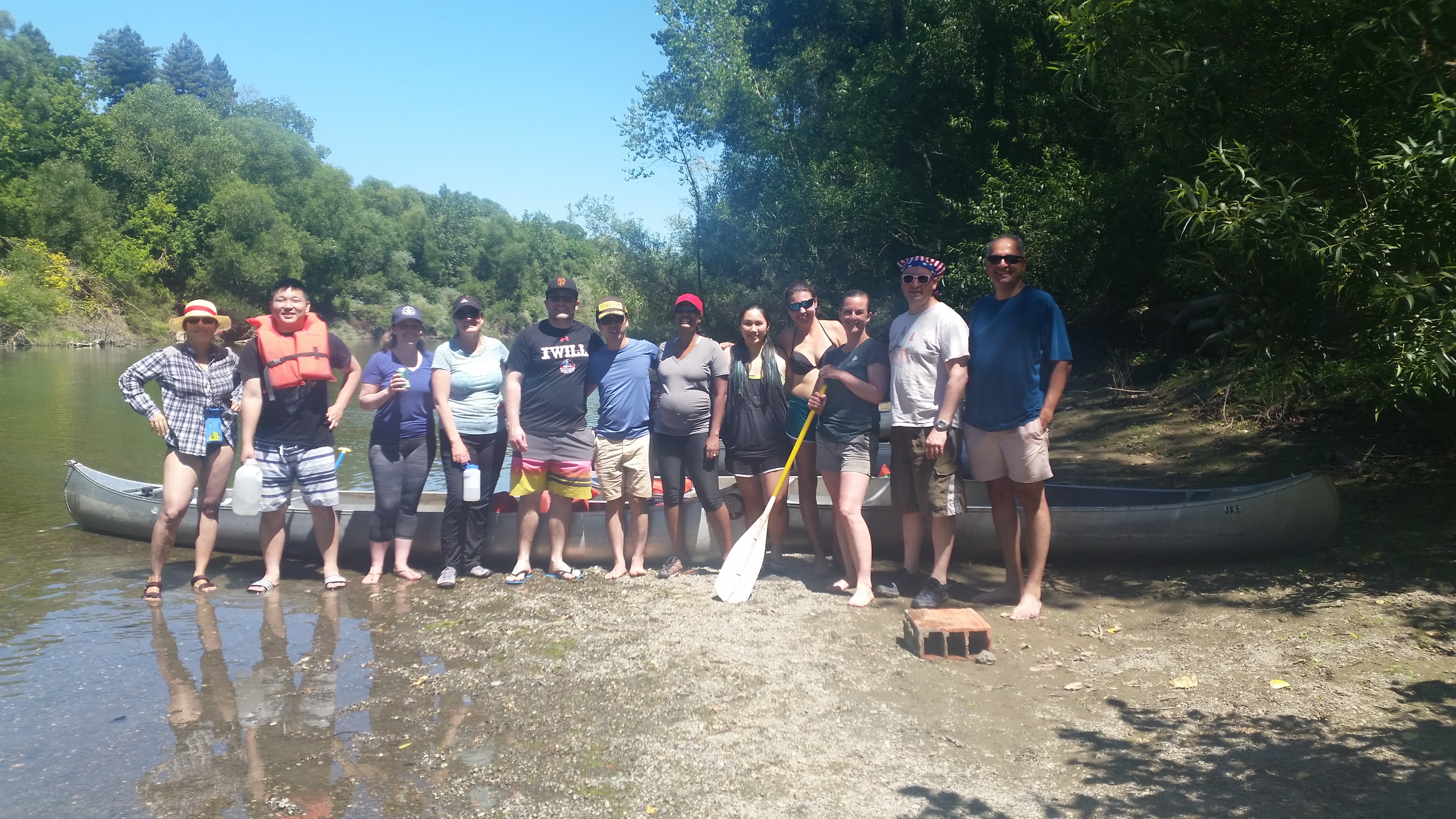 The lab team at a river together